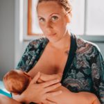 Breastfeeding woman and baby. 